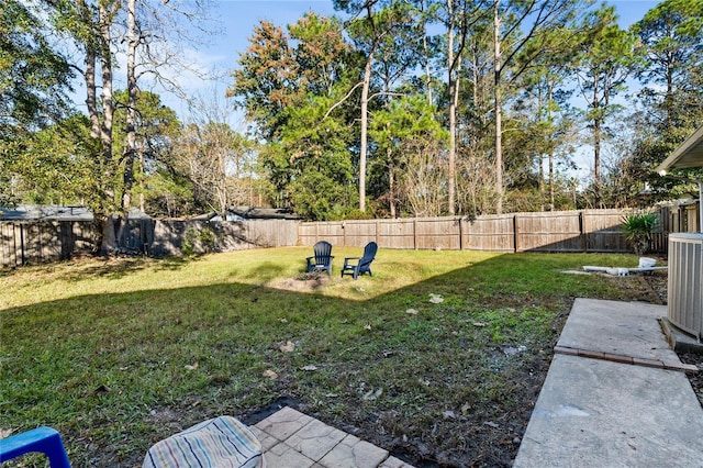 view of yard with central AC unit