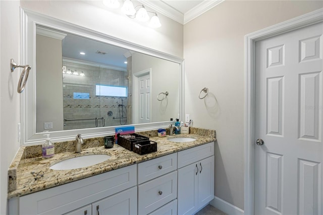 bathroom featuring vanity, a shower with door, and crown molding