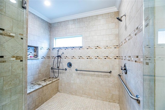 bathroom featuring crown molding and tiled shower