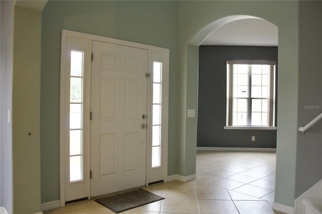 entryway featuring light tile patterned floors