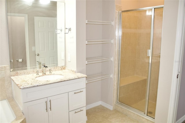 bathroom featuring vanity and walk in shower