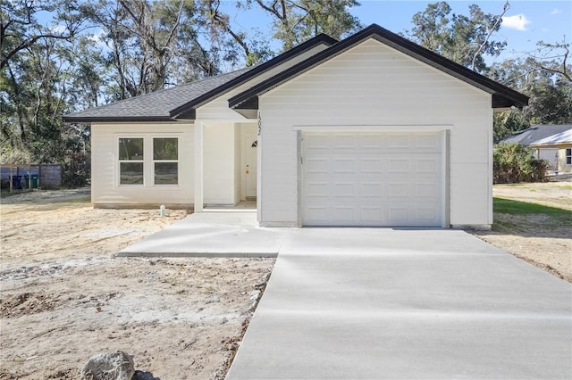 single story home with a garage