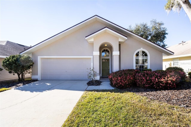 single story home with a garage