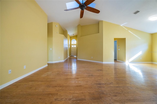 unfurnished room with hardwood / wood-style flooring, ceiling fan, and lofted ceiling