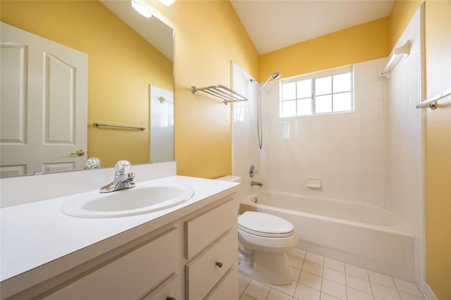 full bathroom featuring tile patterned floors, shower / bathing tub combination, lofted ceiling, toilet, and vanity