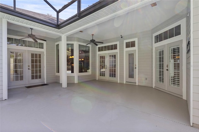 unfurnished sunroom with french doors