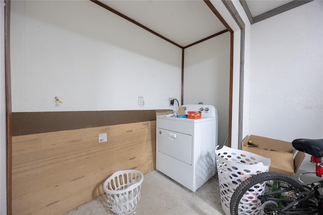 bathroom featuring washer / clothes dryer and concrete flooring