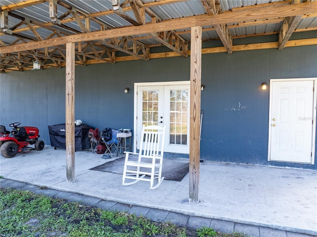 property entrance featuring french doors