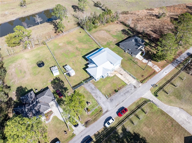 drone / aerial view featuring a water view