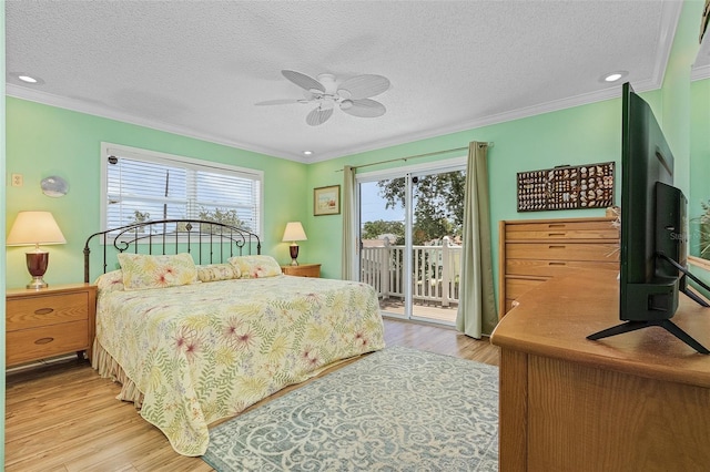 bedroom featuring access to outside, ceiling fan, crown molding, and light hardwood / wood-style floors