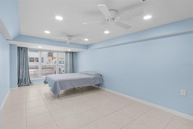 bedroom featuring ceiling fan and light tile patterned floors