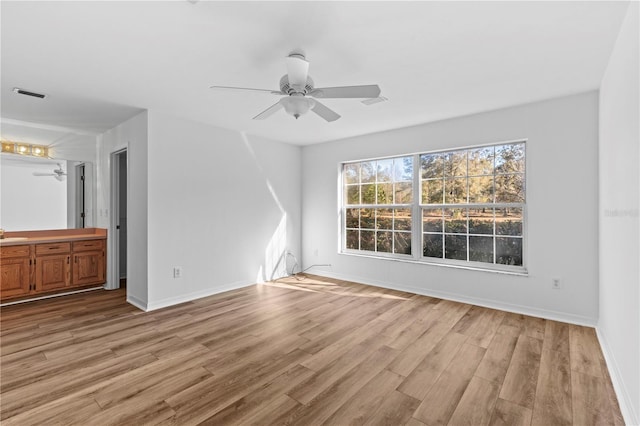 interior space featuring ceiling fan and light hardwood / wood-style flooring