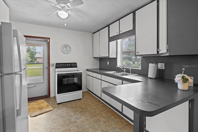 kitchen with white cabinets, white appliances, ceiling fan, and sink