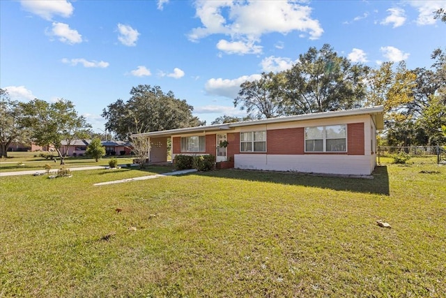 view of front of house with a front lawn