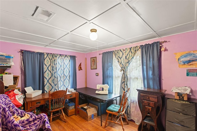 dining room with wood-type flooring