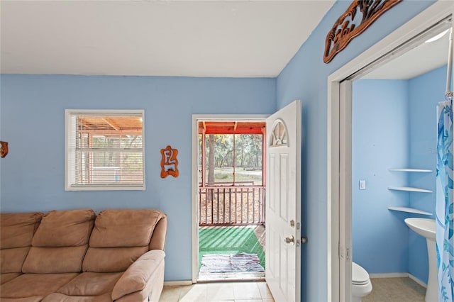 doorway featuring light tile patterned floors