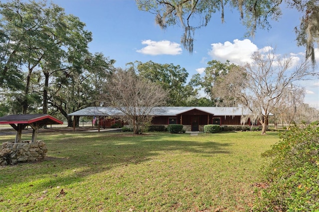 view of yard with a carport