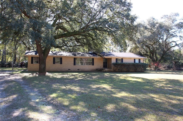 single story home with a front yard