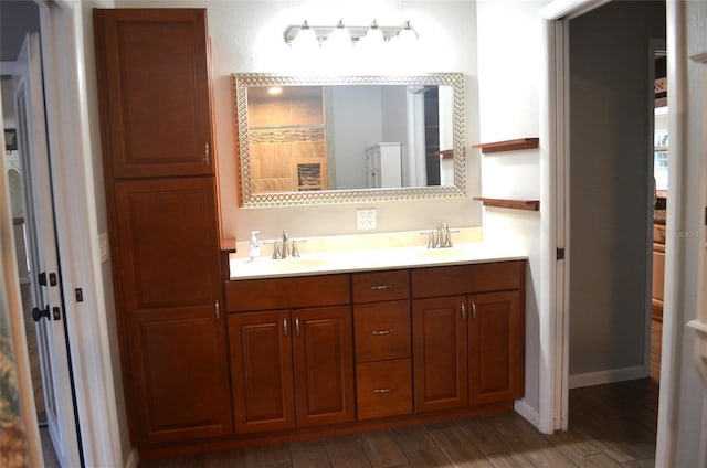 bathroom featuring vanity and hardwood / wood-style flooring