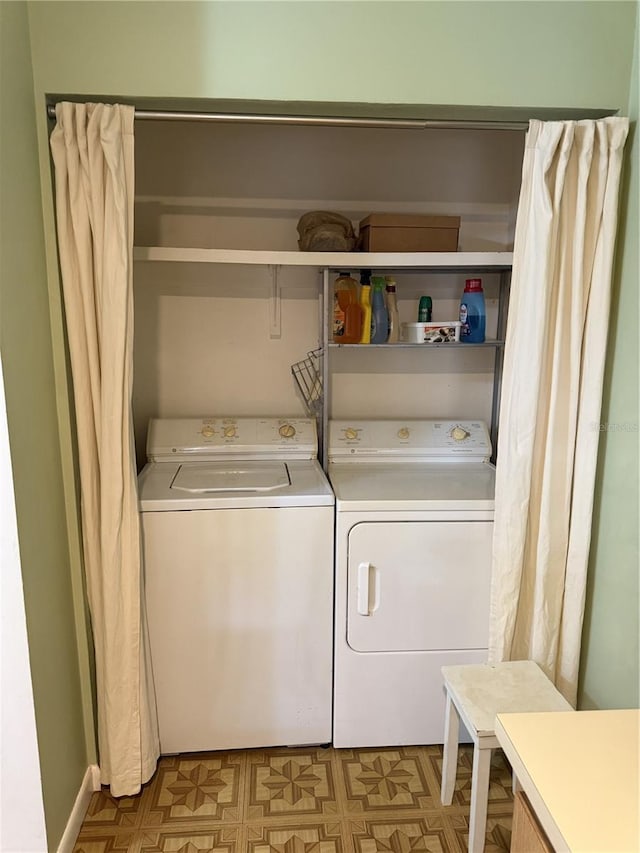 washroom with independent washer and dryer