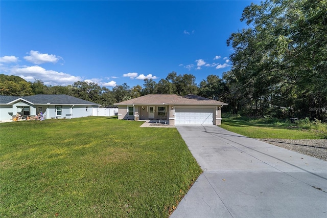 ranch-style house with a garage and a front lawn