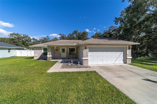 ranch-style house with a front yard, a garage, and covered porch