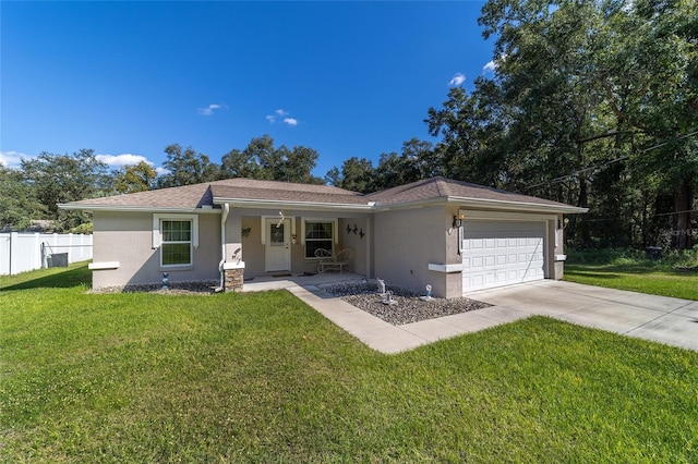 ranch-style home featuring a front yard, a garage, and covered porch