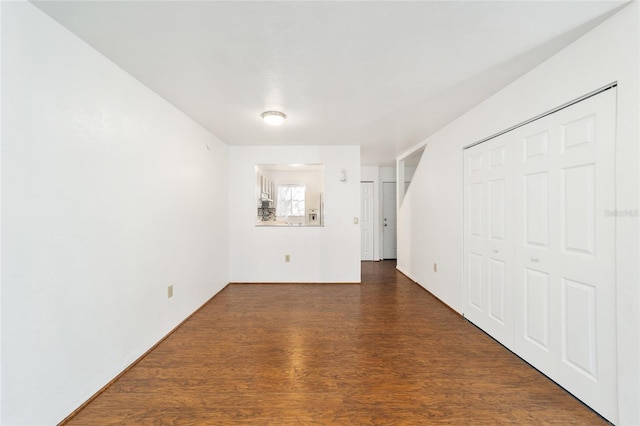 unfurnished room featuring wood finished floors