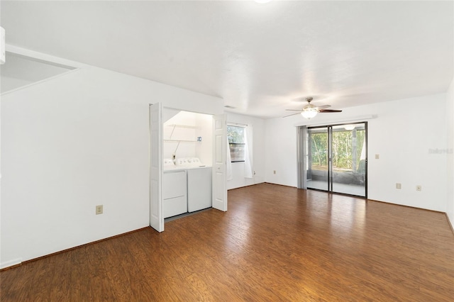 unfurnished room with washer and dryer, ceiling fan, and wood finished floors