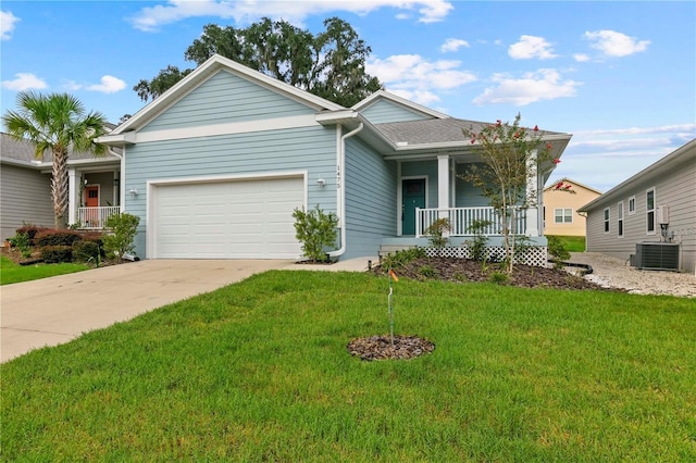 view of front facade with a front yard, central AC, a garage, and covered porch