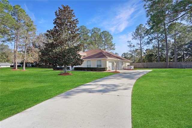 view of front of property with a front lawn