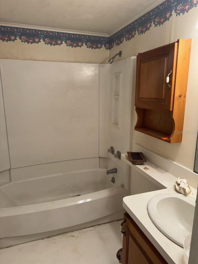 bathroom featuring vanity and bathing tub / shower combination