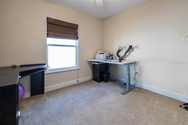 office area with light carpet and ceiling fan