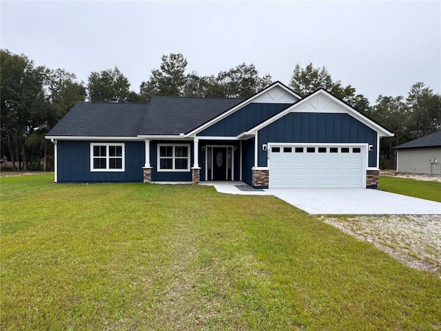 craftsman-style house with a front yard and a garage