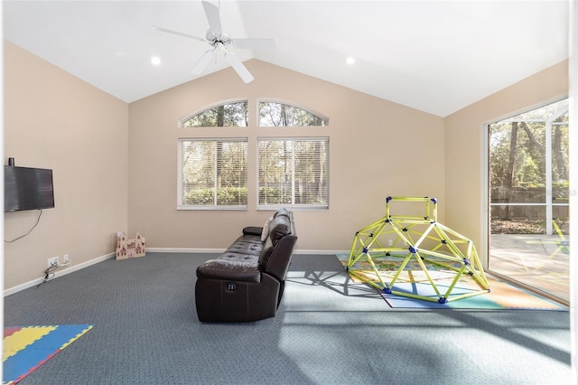 rec room with carpet flooring, ceiling fan, and lofted ceiling