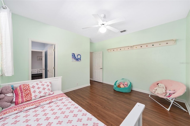 bedroom with ceiling fan and dark wood-type flooring