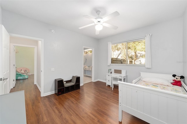 bedroom with dark hardwood / wood-style floors and ceiling fan