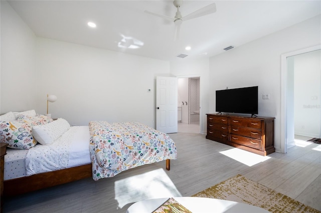 bedroom featuring ceiling fan and light hardwood / wood-style flooring