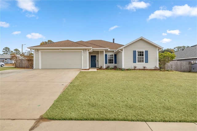 ranch-style home with a front yard and a garage