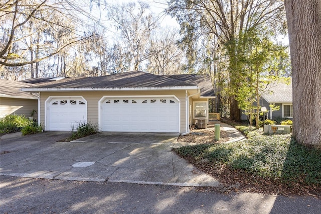 ranch-style home with a garage