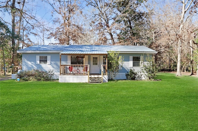 view of front facade with a porch and a front yard