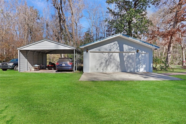 garage featuring a yard and a carport