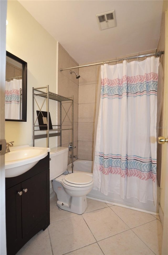 full bathroom featuring tile patterned flooring, vanity, shower / bath combination with curtain, and toilet