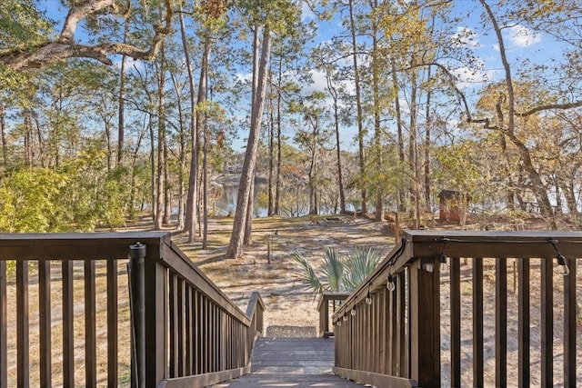 wooden terrace with a water view