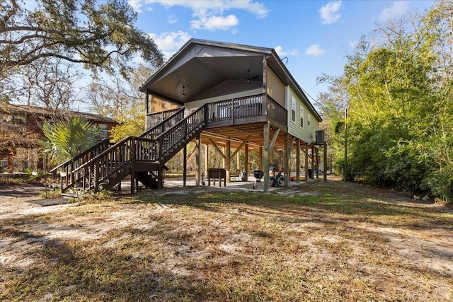 rear view of house with a deck