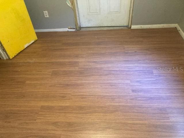 interior details featuring hardwood / wood-style flooring