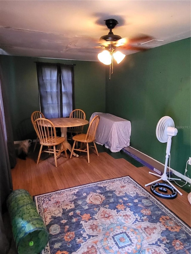 interior space with hardwood / wood-style flooring and ceiling fan