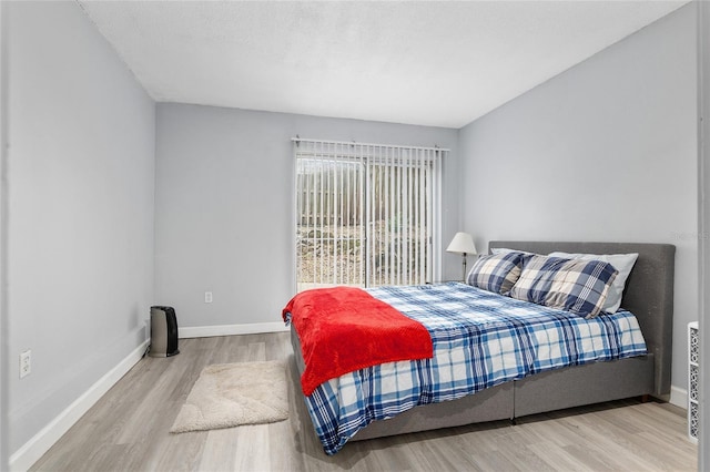 bedroom featuring hardwood / wood-style flooring