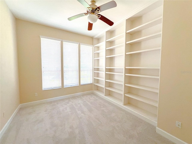 8305 SW 16th Pl, Gainesville, FL 32607 - carpeted empty room with baseboards and ceiling fan