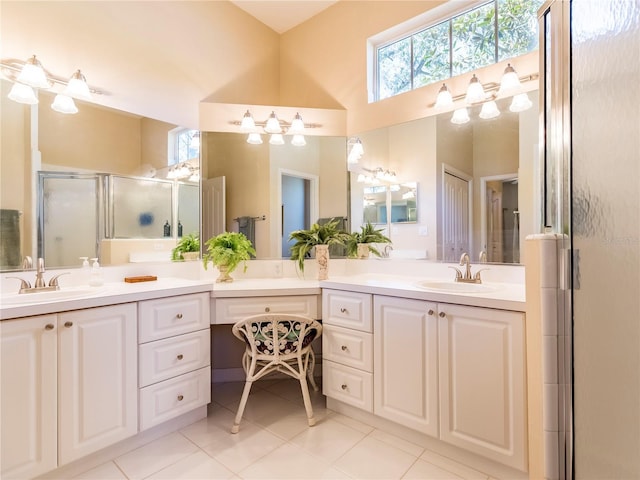 8305 SW 16th Pl, Gainesville, FL 32607 - full bath with double vanity, a shower stall, and tile patterned flooring